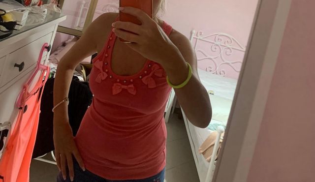 Canotta con fiocchi e brillantini color pesca