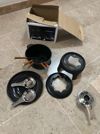 Juego de fondue de hierro