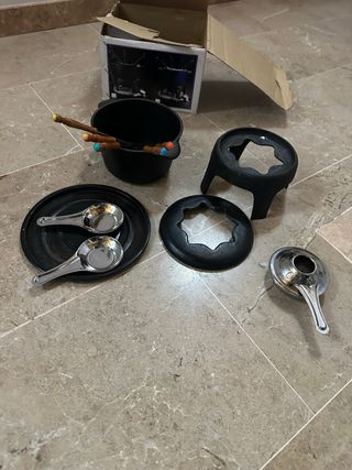 Juego de fondue de hierro