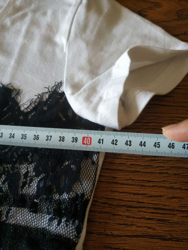 T-SHIRT BIANCA CON PIZZO