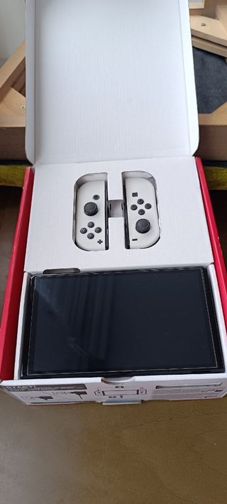Nintendo switch OLED+extra e 5 giochi
