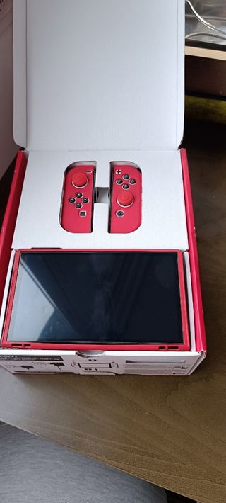 Nintendo switch OLED+extra e 5 giochi