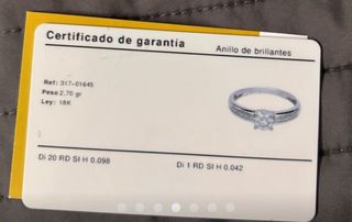 Anillo de compromiso ,oro blanco 