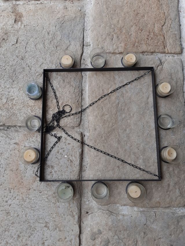 Lámpara de velas y hierro