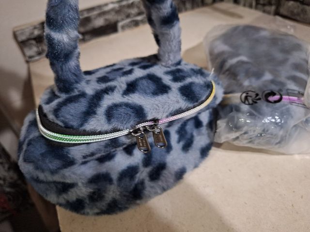 Neceser leopardo gris