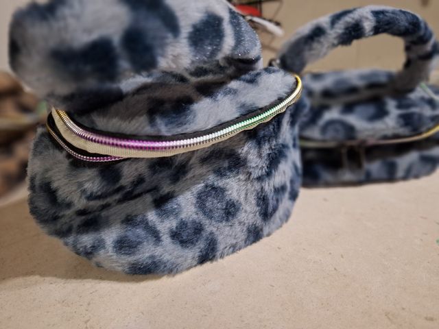 Neceser leopardo gris