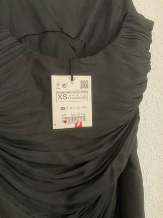 Vestido con drapeados