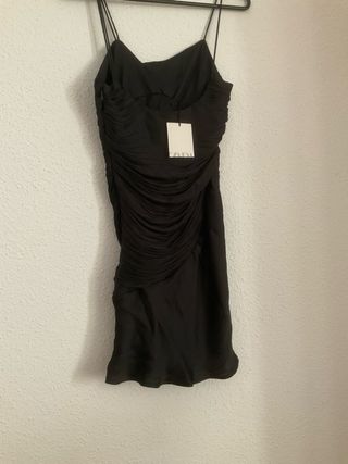 Vestido con drapeados