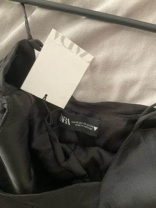 Vestido con drapeados