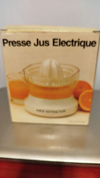 Exprimidor electrico