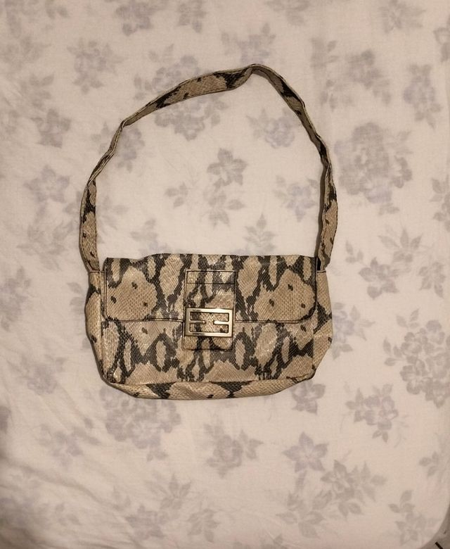 Borsetta simil pitone