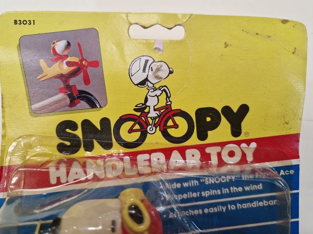 Snoopy Handlebar Toy años 70s