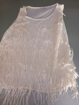 Blusa blanco roto con flecos 