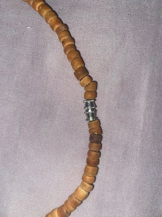 Conjunto de collar y anillos