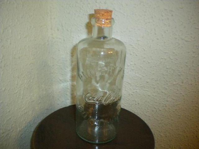 Botella de Coca Cola redonda