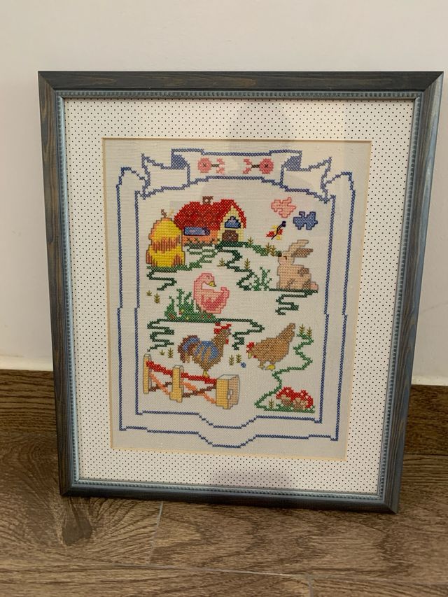 Mosaico de punto de cruz enmarcado