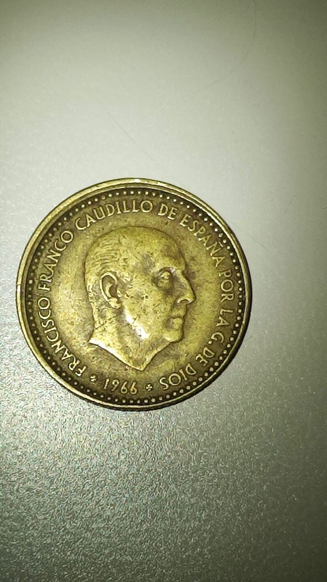 PESETA 1966 CON ERROR DE ACUÑACIÓN CANTO Y BORDE