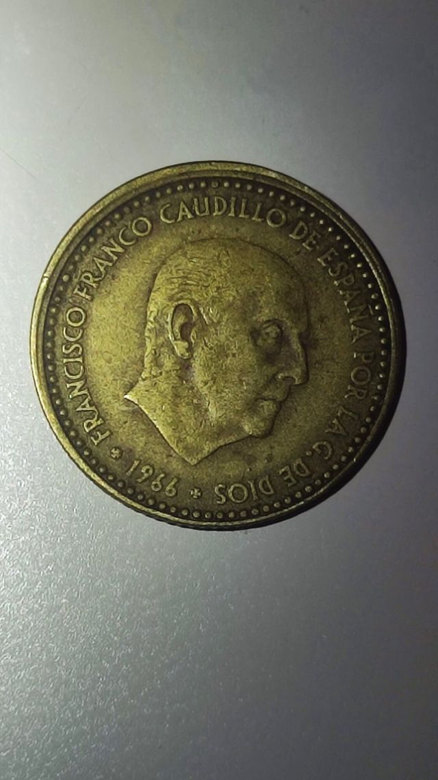 PESETA 1966 CON ERROR DE ACUÑACIÓN CANTO Y BORDE