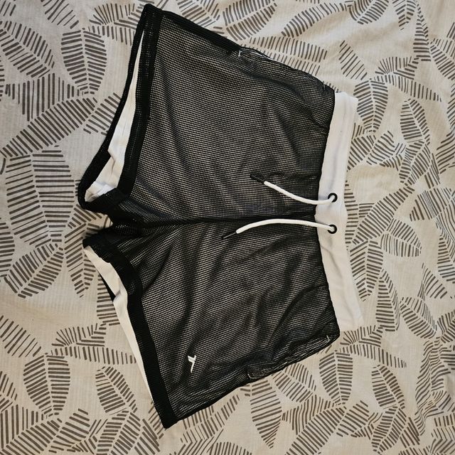 Shorts rejilla