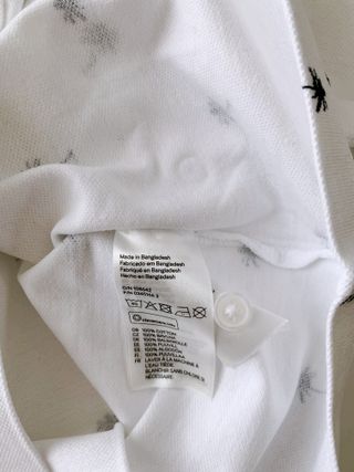Polo bianca in cotone stampa palme