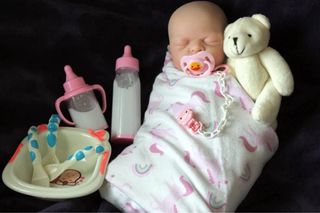 Bebe reborn silicona platino