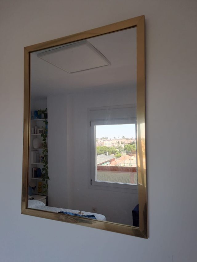 Espejo borde de madera dorada