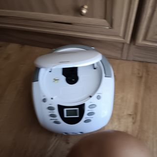 Reproductor CD portátil con  asa.