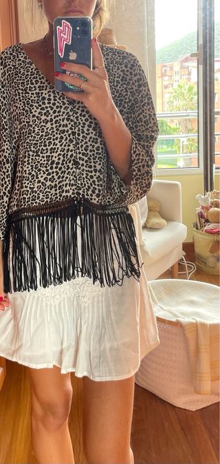 Blusa leopardo con flecos