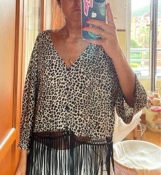 Blusa leopardo con flecos
