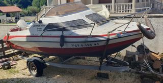 . .ncha, barco, embarcación de recreo con motor.