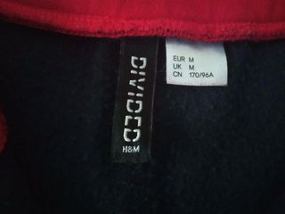 Sudadera con cremallera.