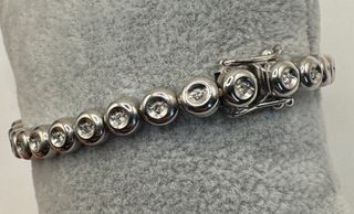 Pulsera riviere de oro de 18 kt con diamantes
