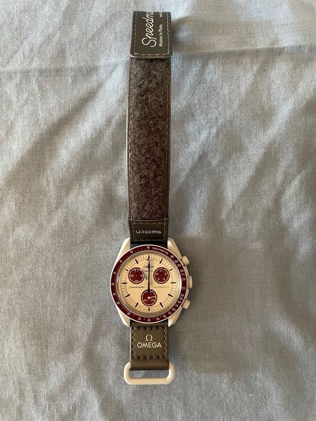 Reloj swatch omega (pluto)