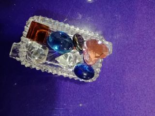 Cenicero y piedras cristal