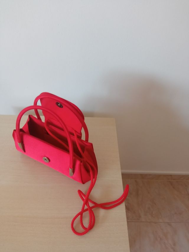 Bolsos de mano como lo colgado