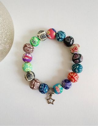 Pulsera bolas de flores