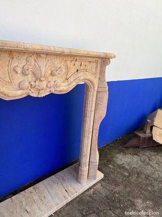 FRENTE DE CHIMENEA EN MARMOL TALLADO