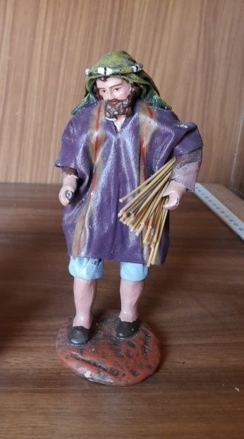 Pastor barro con leña