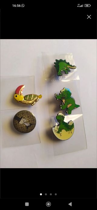 5 pines vintage de dinosaurios y otros