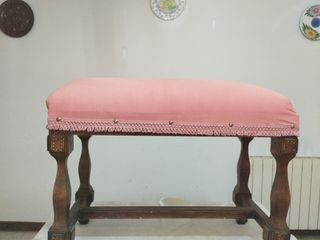 Banqueta antigua acolchada