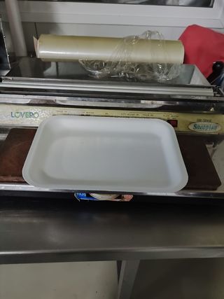 Selladora de bandejas.