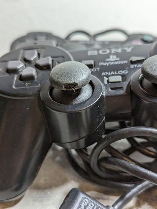 Sony PS2 boxata con accessori