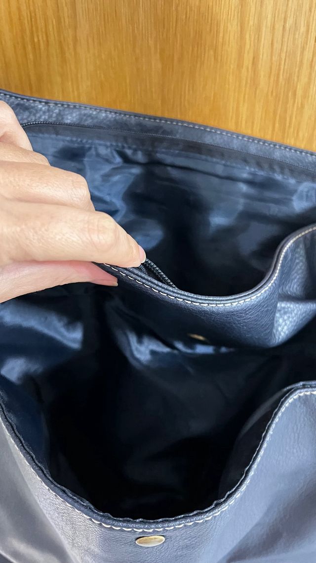 Mala azul Benetton (à tiracolo)