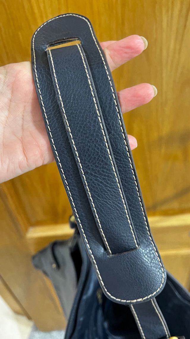 Mala azul Benetton (à tiracolo)