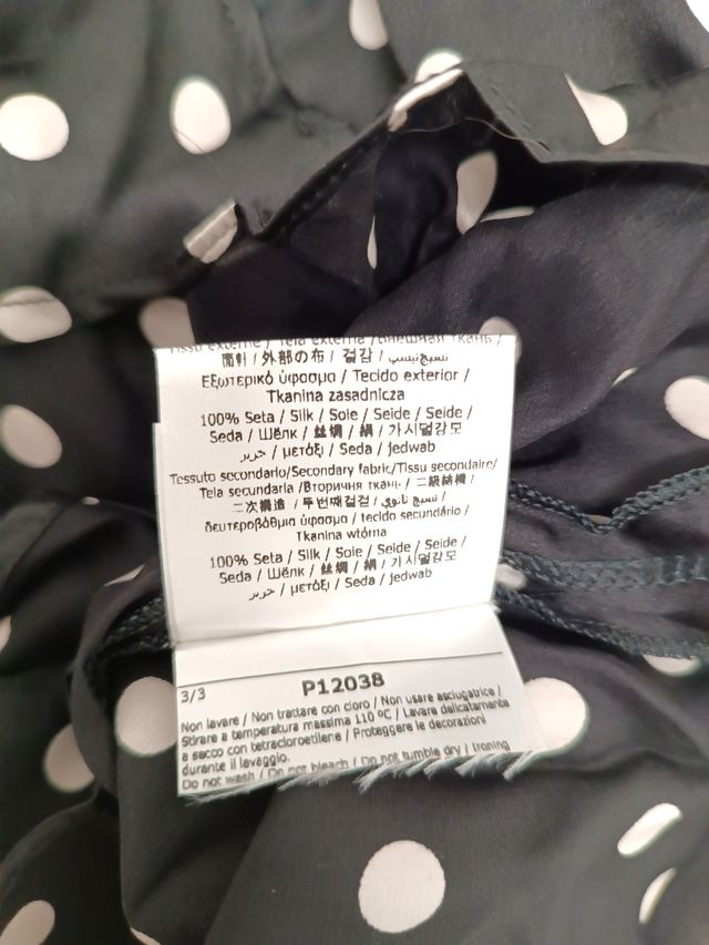 Mini gonna S di seta a puntini bianco e nero, pois