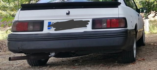 Defensa trasera Ford sierra 4puertas
