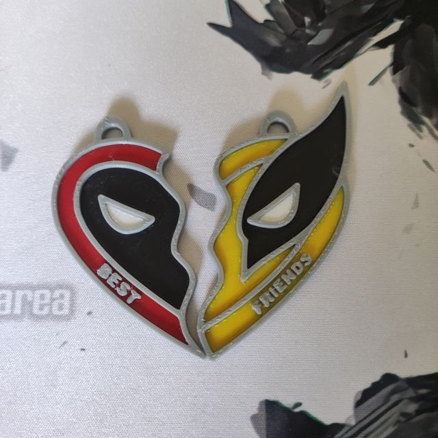 Llavero Deadpool y Wolverine