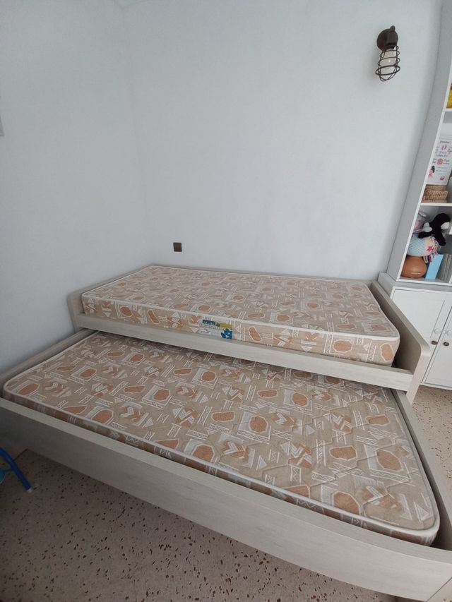 Cama doble con cajones
