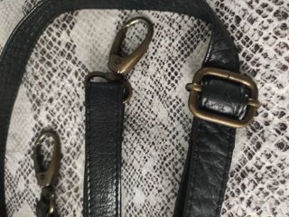 cinturón negro con mosquetones