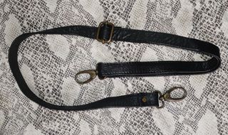 cinturón negro con mosquetones